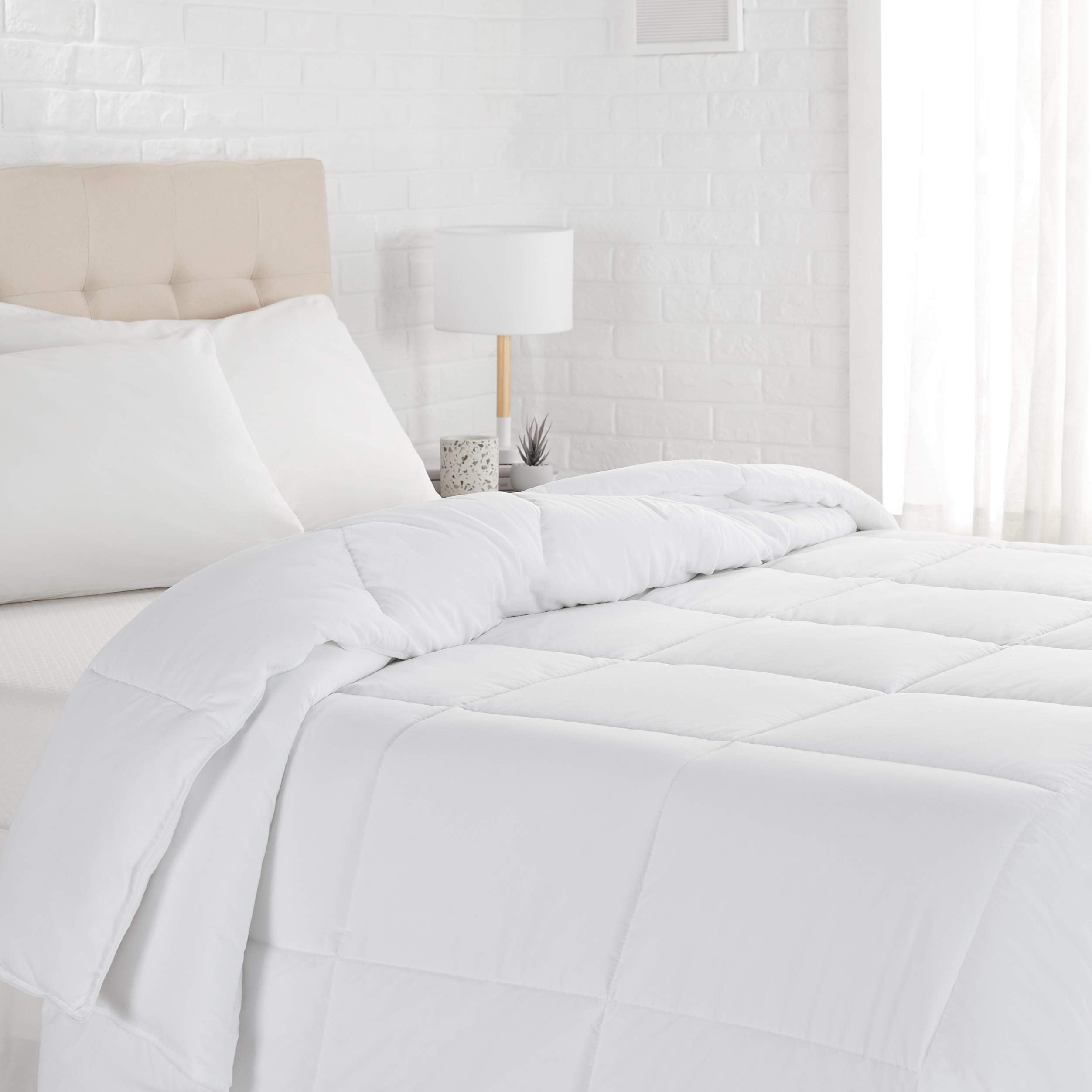 Amazon Basics king comforter front view shows crisp white bedding and cozy appeal
