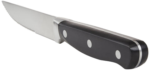 Amazon Basics knives in use at a dinner table showing comfortable cutting and consistent portions