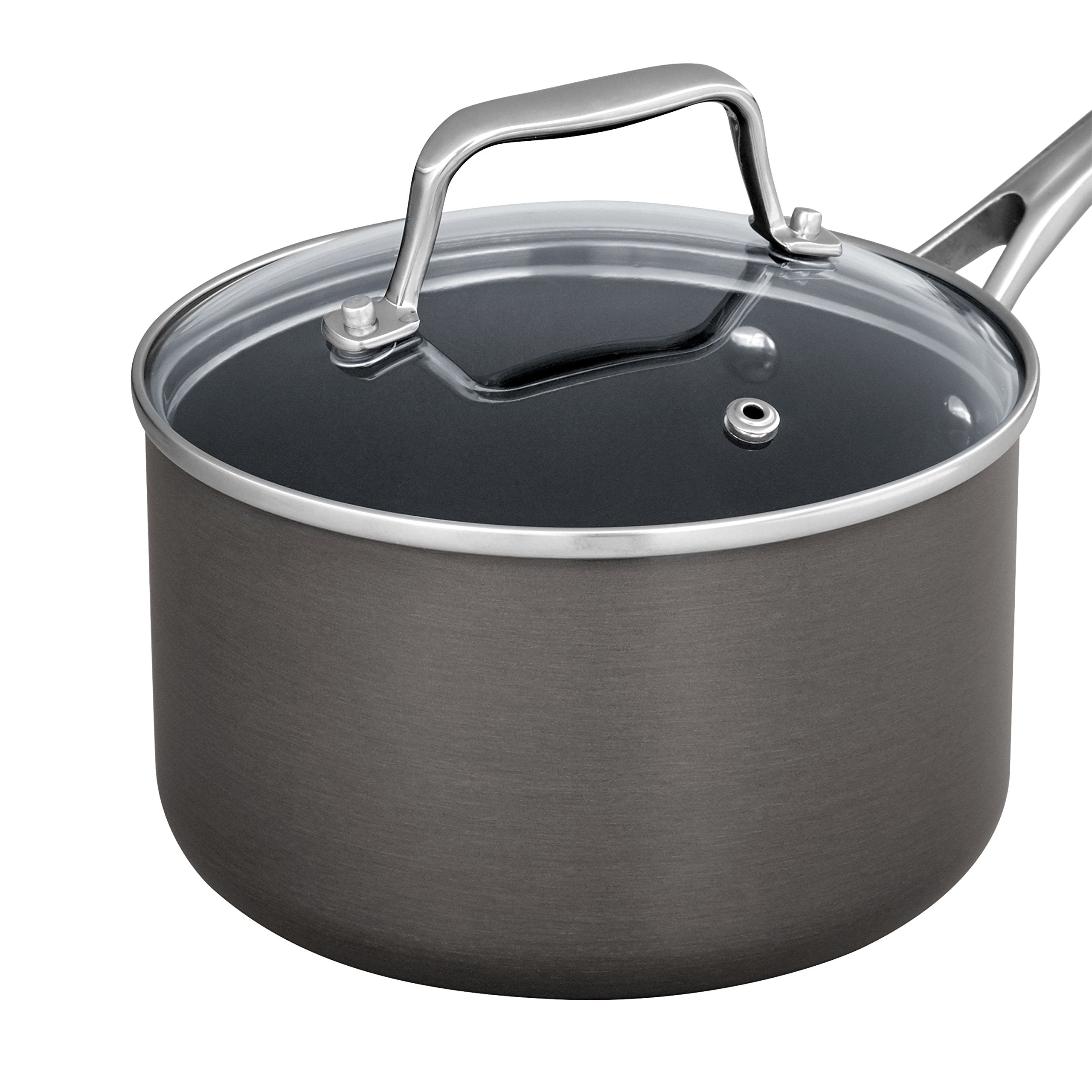 Amazon Basics saucepan beside measuring cup showing scale and compact storage benefit