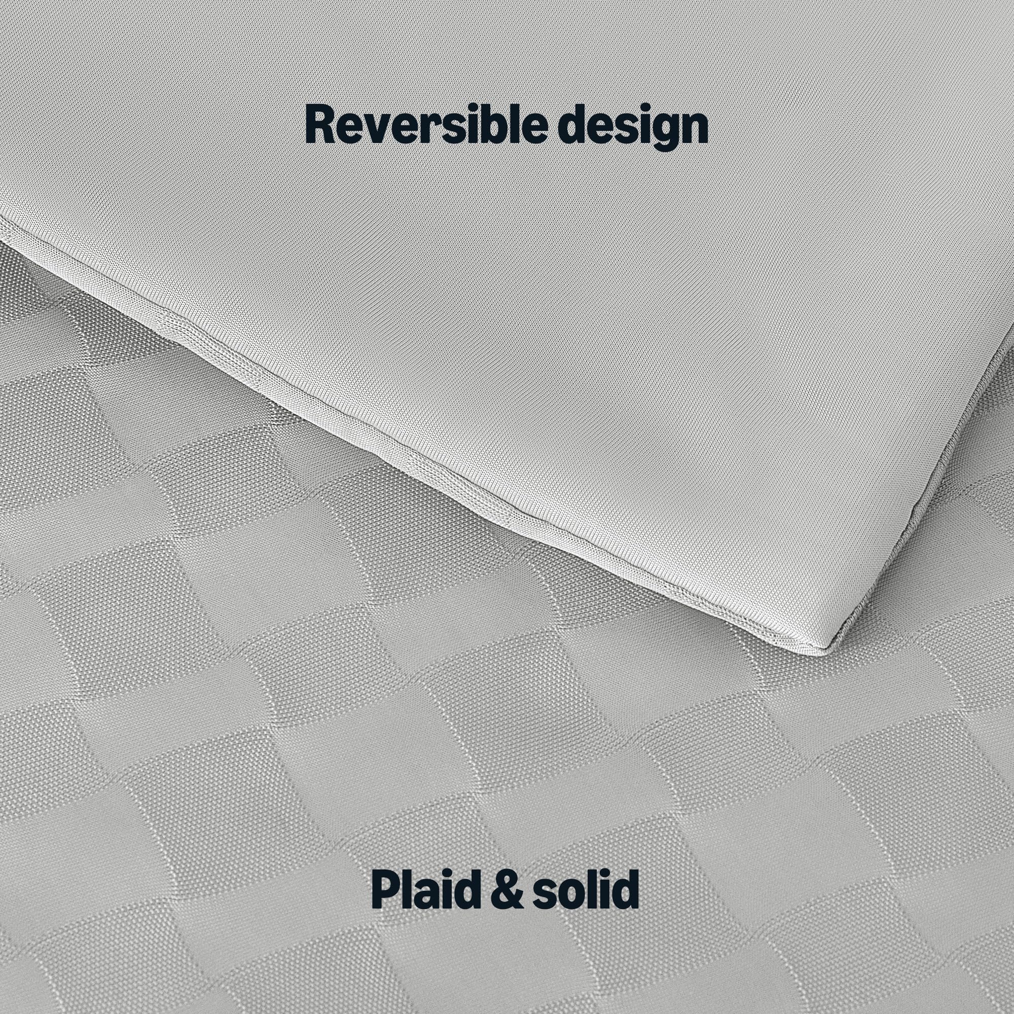 Amazon Basics comforter on a made queen bed illustrating cool, layered styling