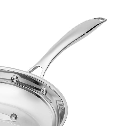 Amazon Basics skillet in use searing steak, demonstrating high-heat performance