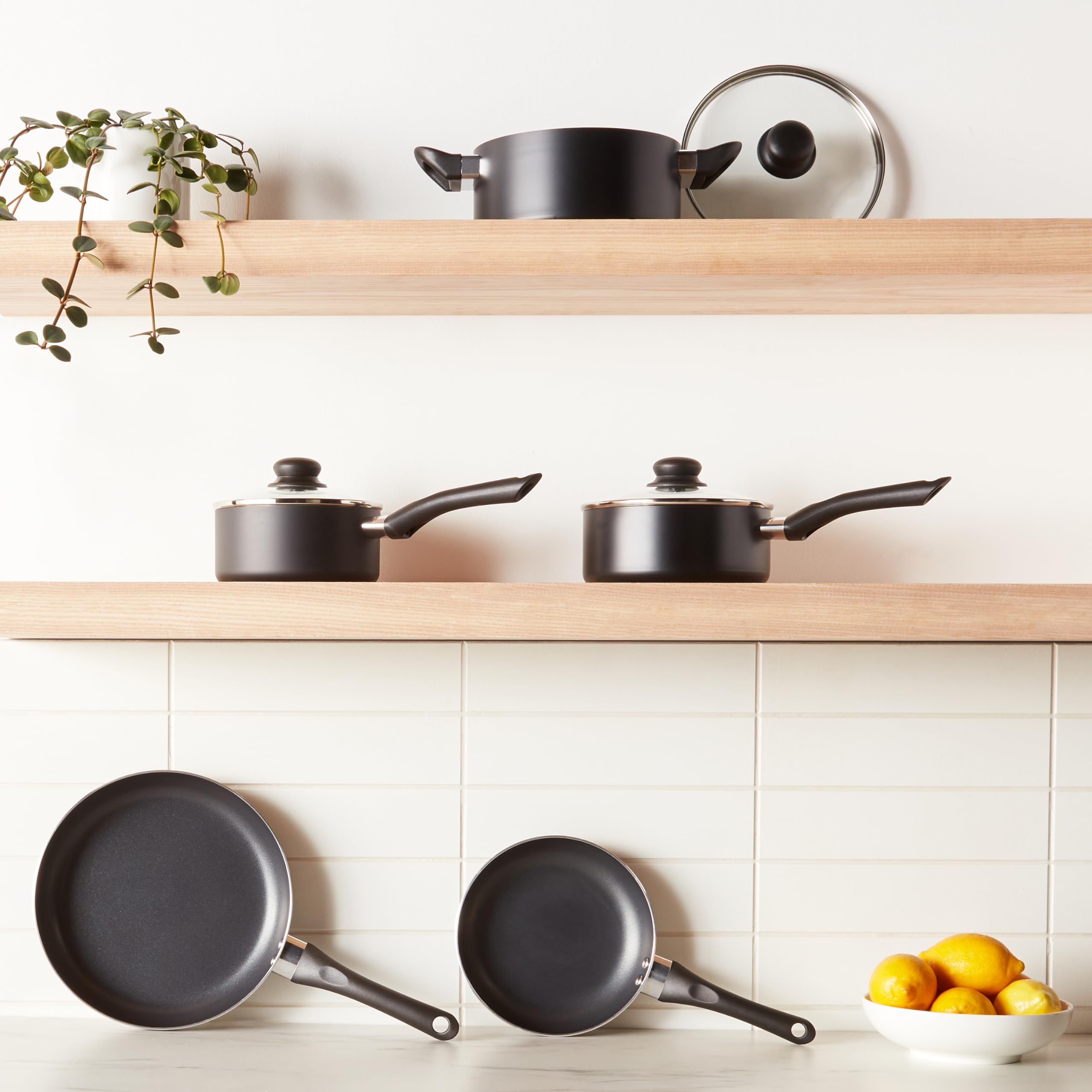 Amazon Basics skillet on stovetop cooking eggs demonstrating even heat and quick cleanup benefit