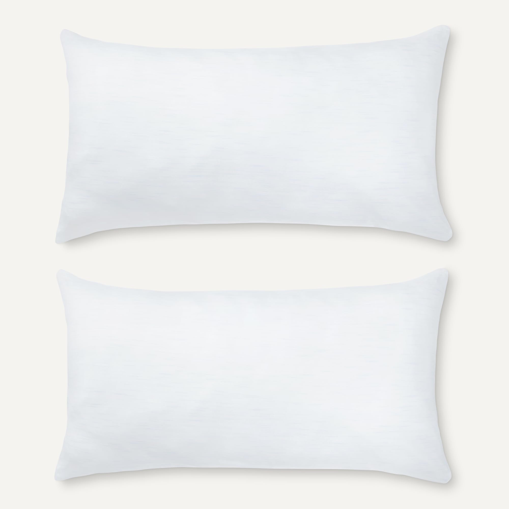 Amazon Basics pillow on a made bed illustrating medium support and sleep posture benefit