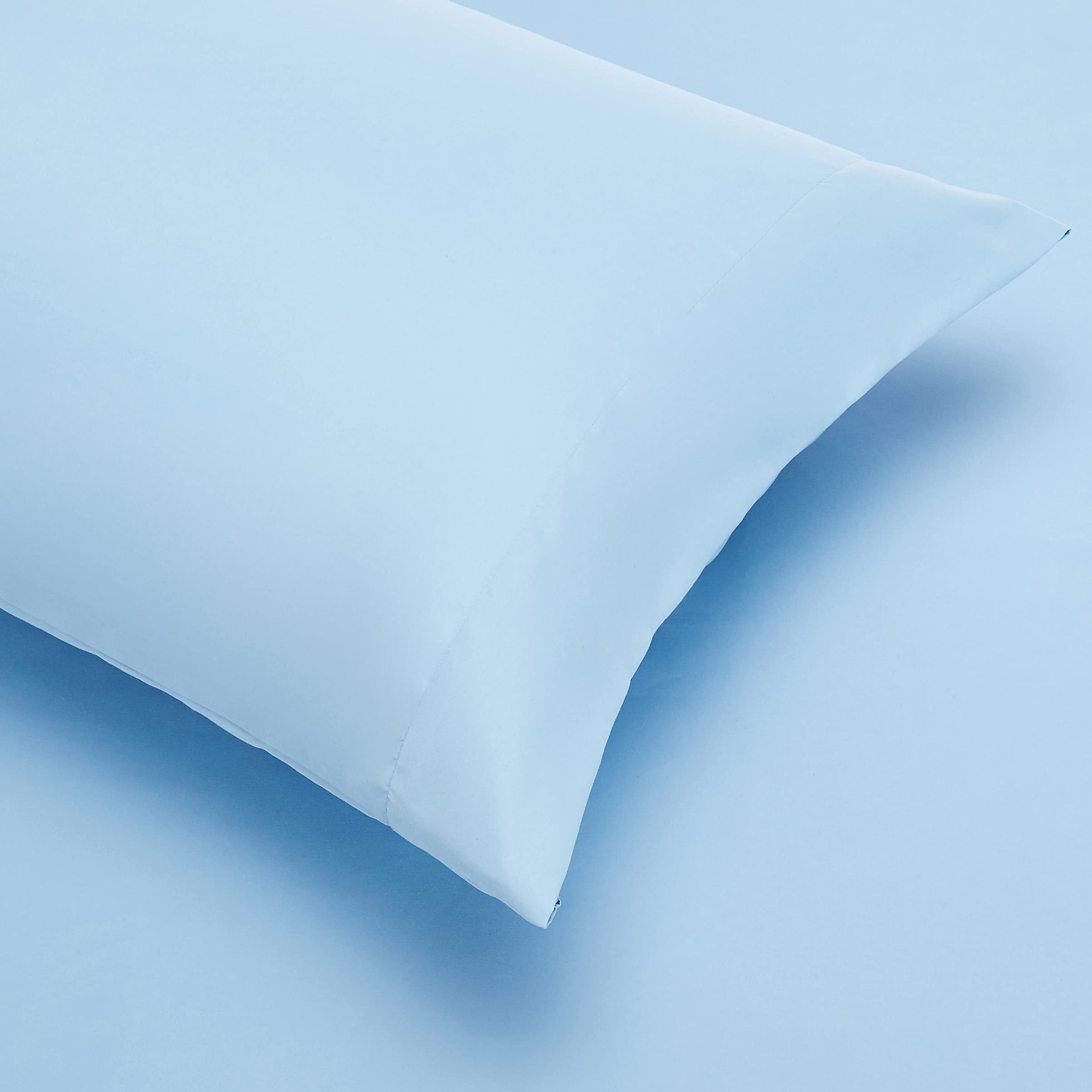 Amazon Basics sham and pillowcase detail showing striped pattern and tidy finish
