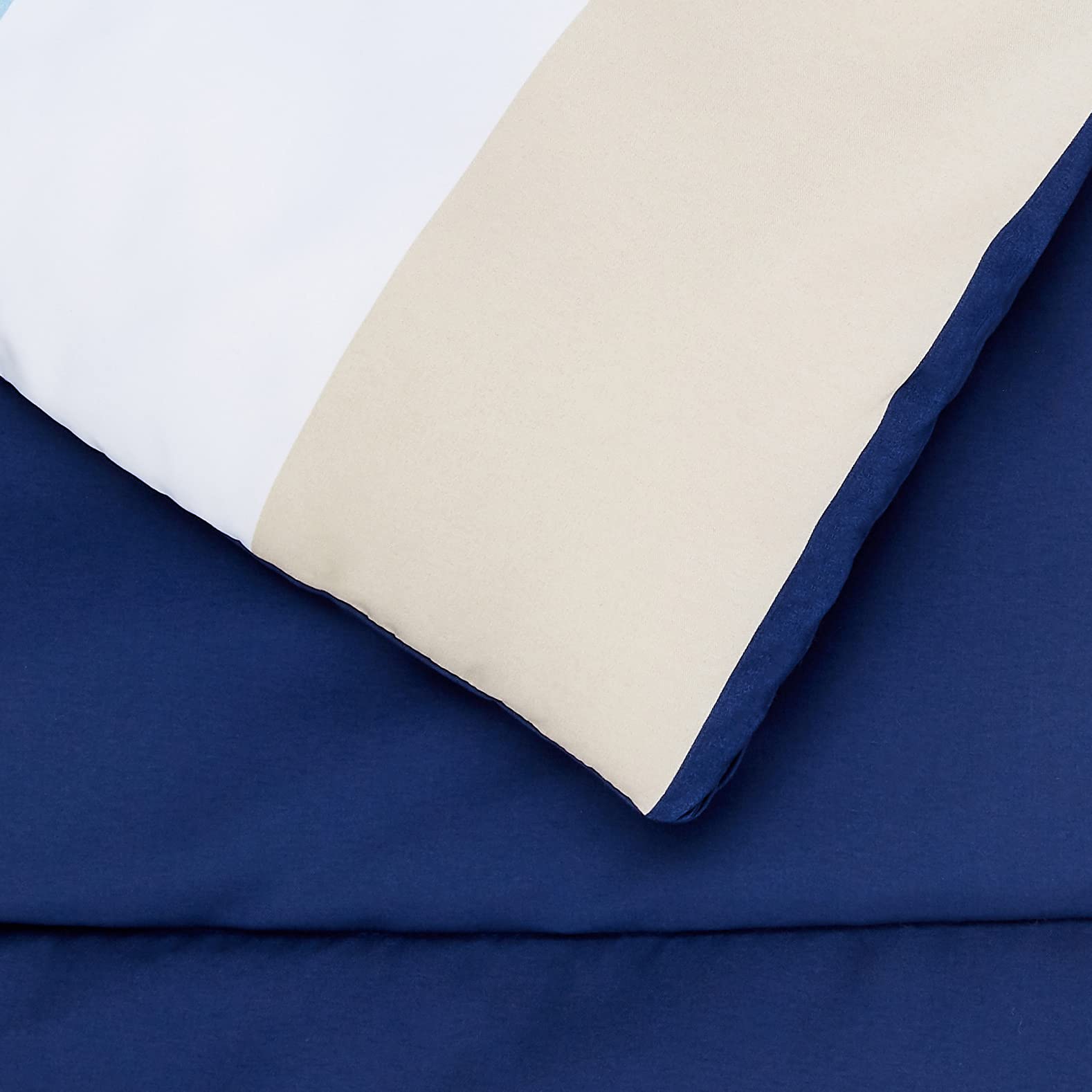 Amazon Basics fitted sheet pocket depth demonstration showing snug mattress fit