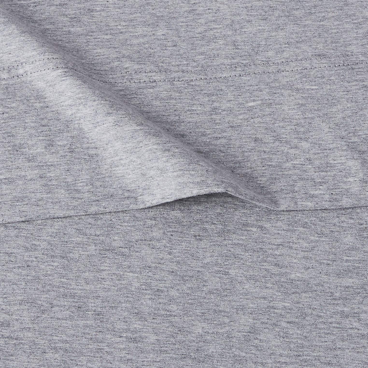 Amazon Basics pillowcase close-up showing knit quality and soft hand for restful sleep