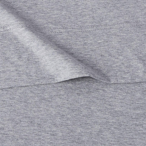 Amazon Basics pillowcase close-up showing knit quality and soft hand for restful sleep