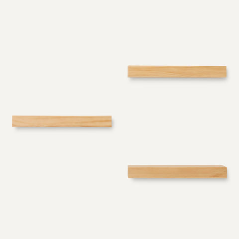 Amazon Basics shelves mounted in bathroom holding toiletries for organized storage benefit