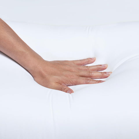Amazon Basics pillow next to ruler showing 26x20 inch standard size for fit