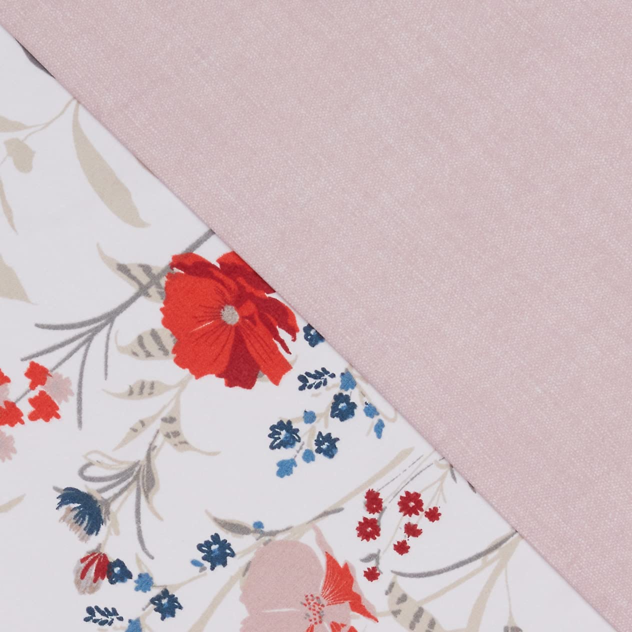 Amazon Basics shams and pillowcases arranged to show matching floral design and easy styling