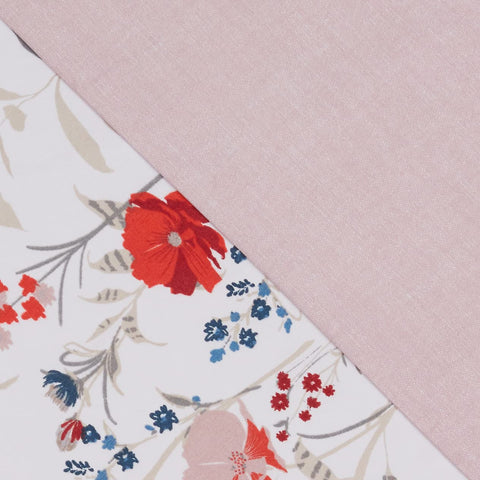 Amazon Basics shams and pillowcases arranged to show matching floral design and easy styling