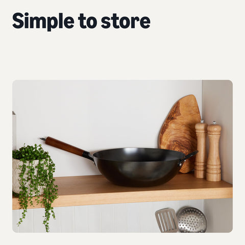 Amazon Basics wok beside spatula showing 12.6-inch scale for home portions
