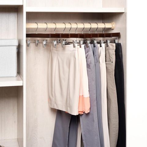 Amber Home hanger holding a pair of jeans demonstrating strong clip grip and crease prevention