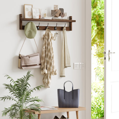 AMBIRD top shelf displaying plant and frames for decorative storage benefit