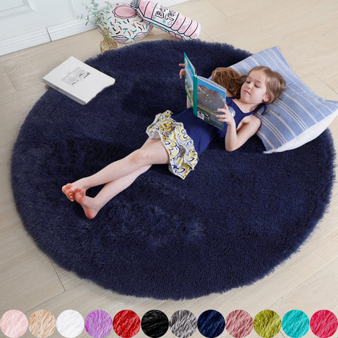 Amdrebio front view of dark navy round rug showing plush look and color benefit