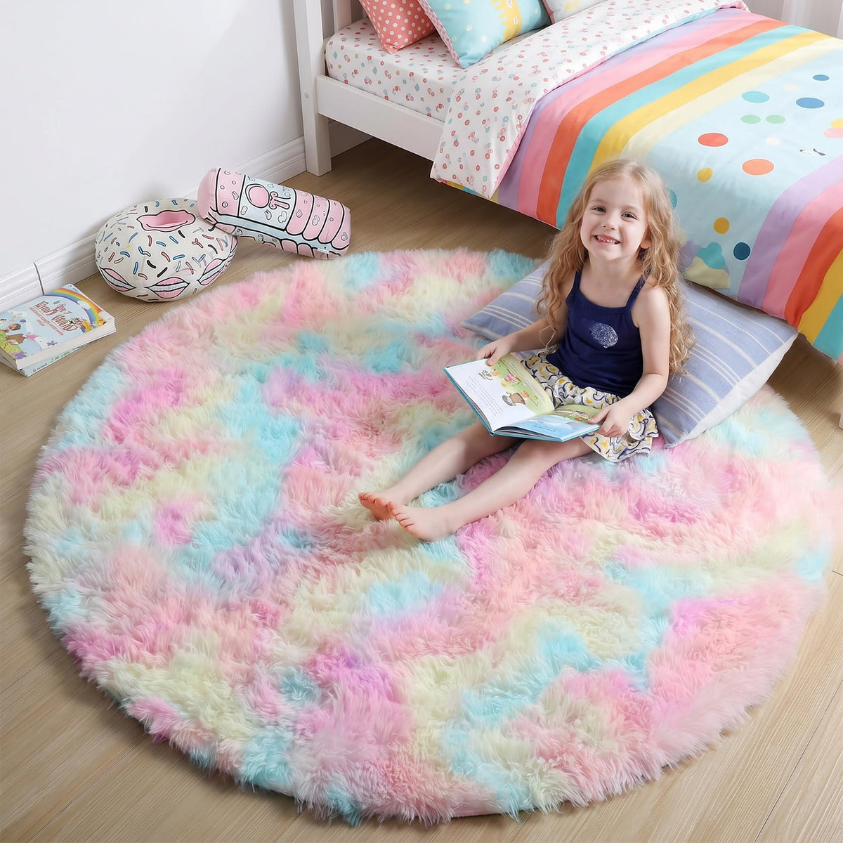 Amdrebio front view of round unicorn rug showing pastel design and bright colors