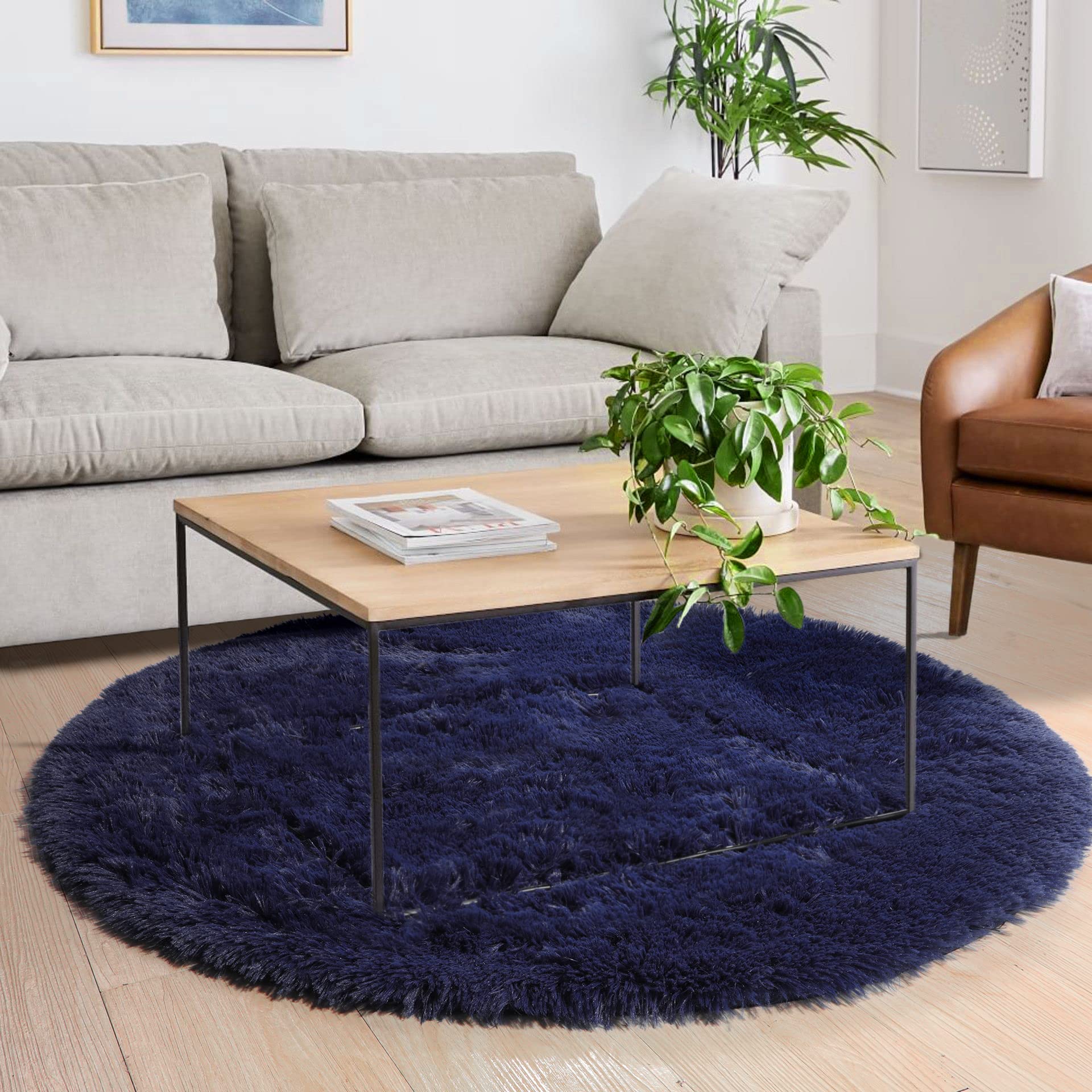 Amdrebio round rug beside toys showing 4ft scale and child-friendly size benefit