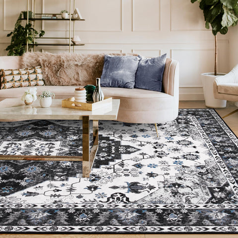 Amearea rug in living room under coffee table adding classic style and warmth