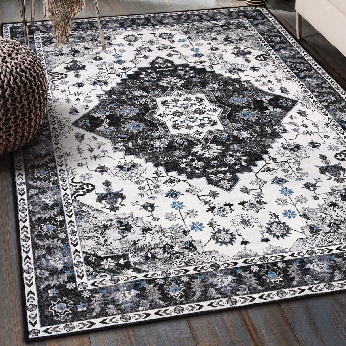 Amearea front view of vintage 4x6 black rug showing overall pattern and shape