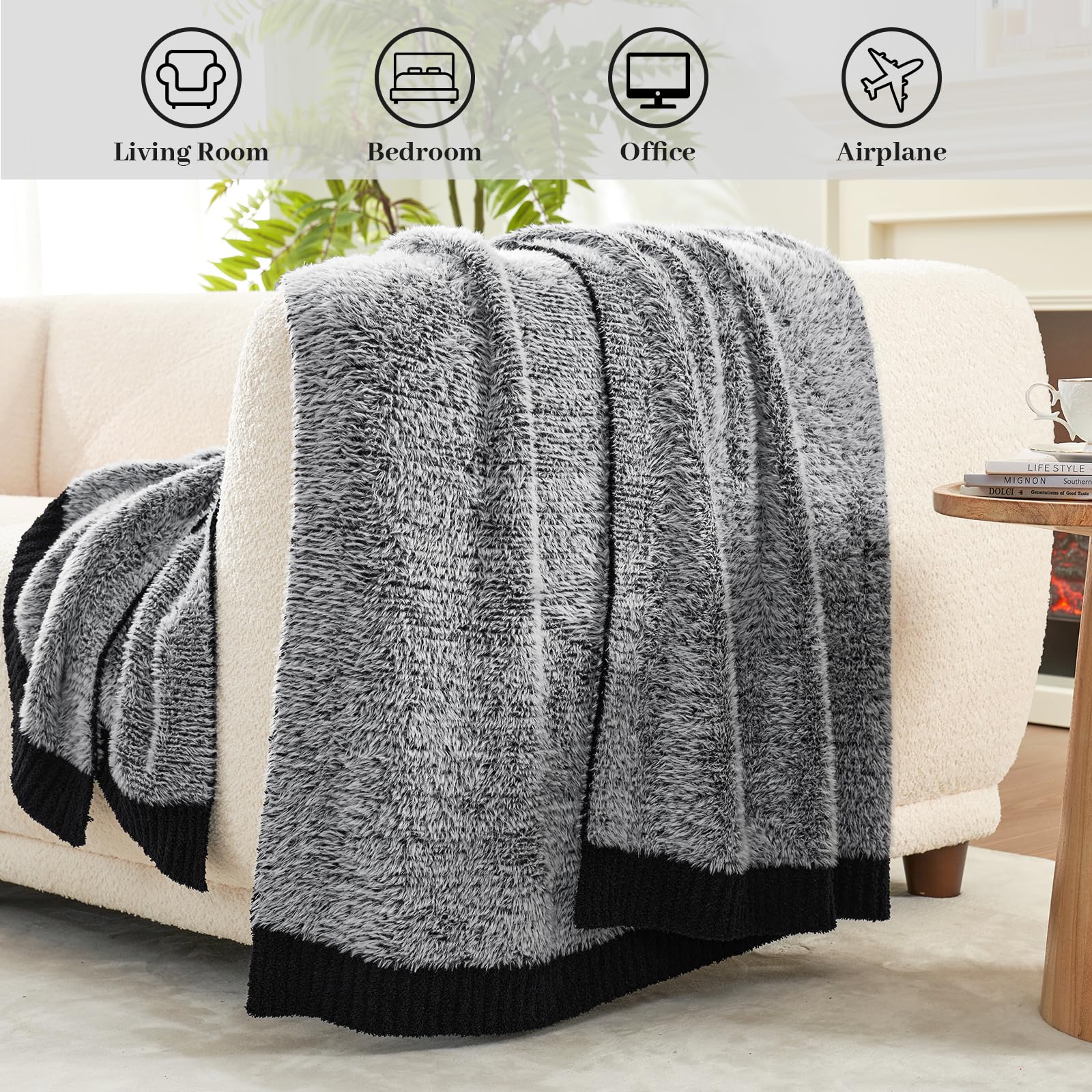 Amélie Home blanket draped over sofa adding elegant warmth and living room style