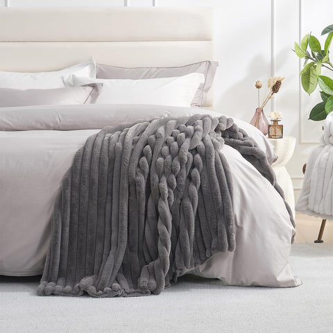 Amélie Home draped on sofa demonstrating full coverage and elegant look