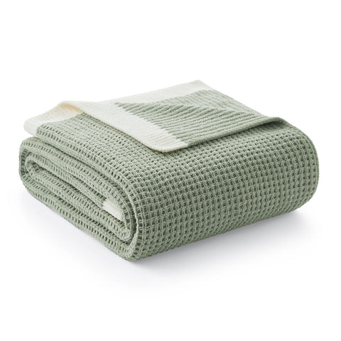 Amélie Home front view of green chenille waffle throw showing overall shape and color, enhances living room style
