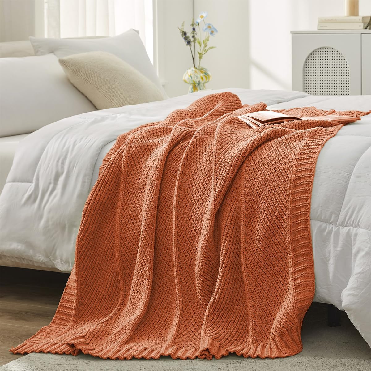Amélie Home chenille throw front view showing warm orange color and cozy appeal