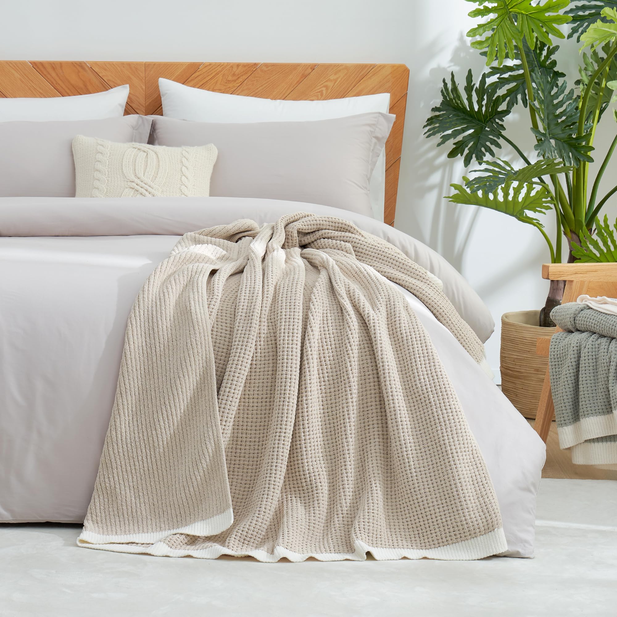 Amélie Home hand touching chenille showing soft velvety feel