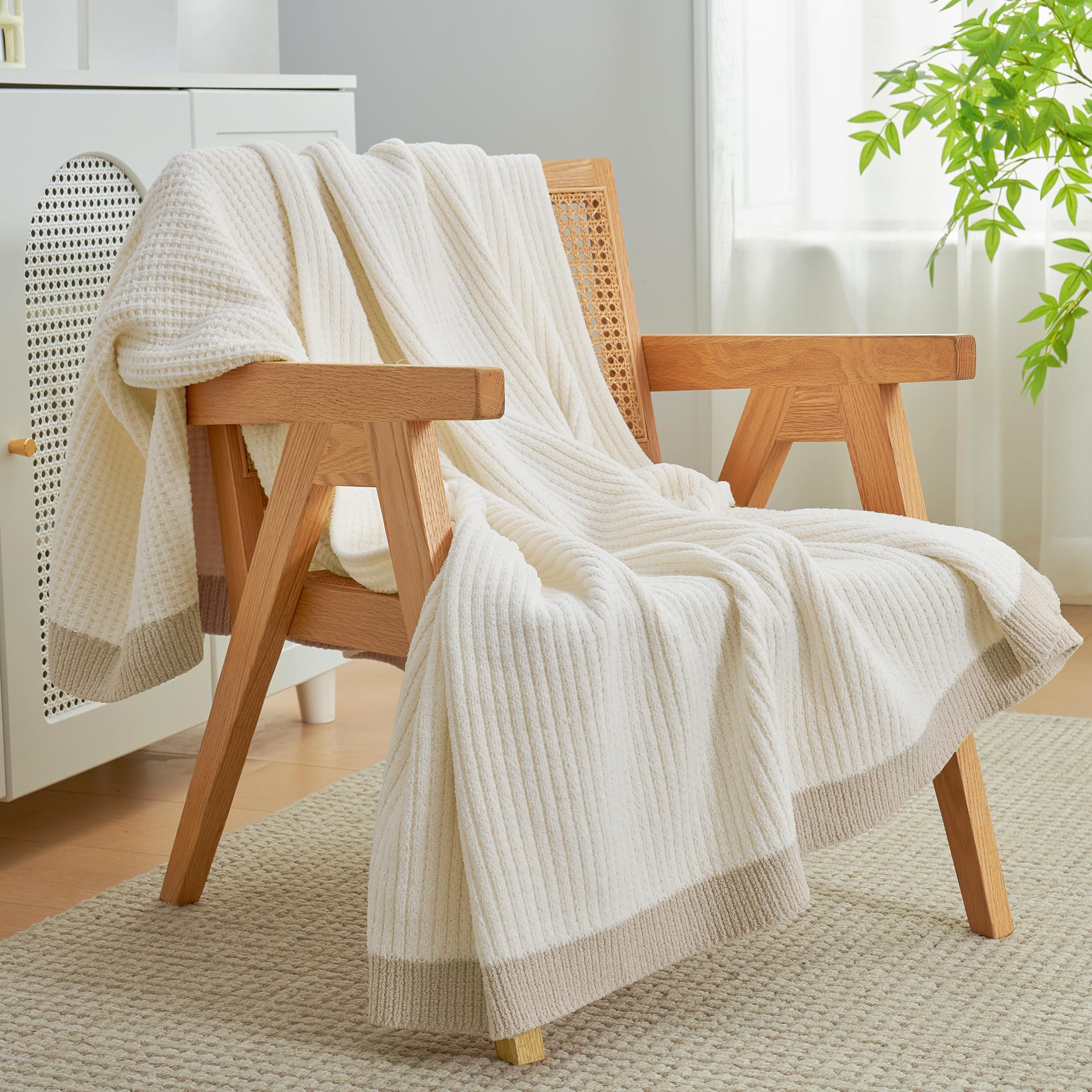 Amélie Home throw beside chair to illustrate 50x60 size and practical scale for couches
