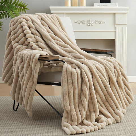Amélie Home throw draped on bed adding warmth and elegant decor