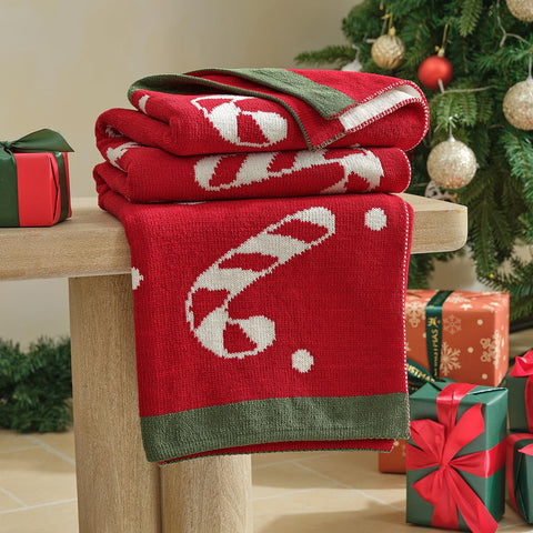 Amélie Home folded throw styled as gift conveys ready-to-give convenience