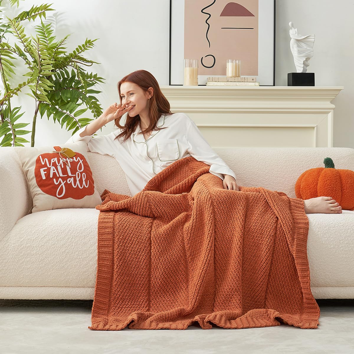 Amélie Home neatly folded on bed showing size and polished bedroom accent