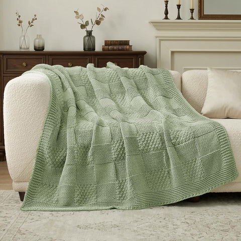Amélie Home folded throw on shelf for neat storage and quick access