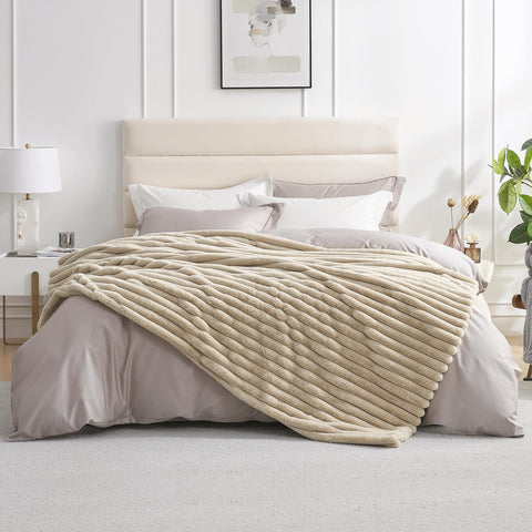 Amélie Home folded front view showing plush throw and decorative appeal