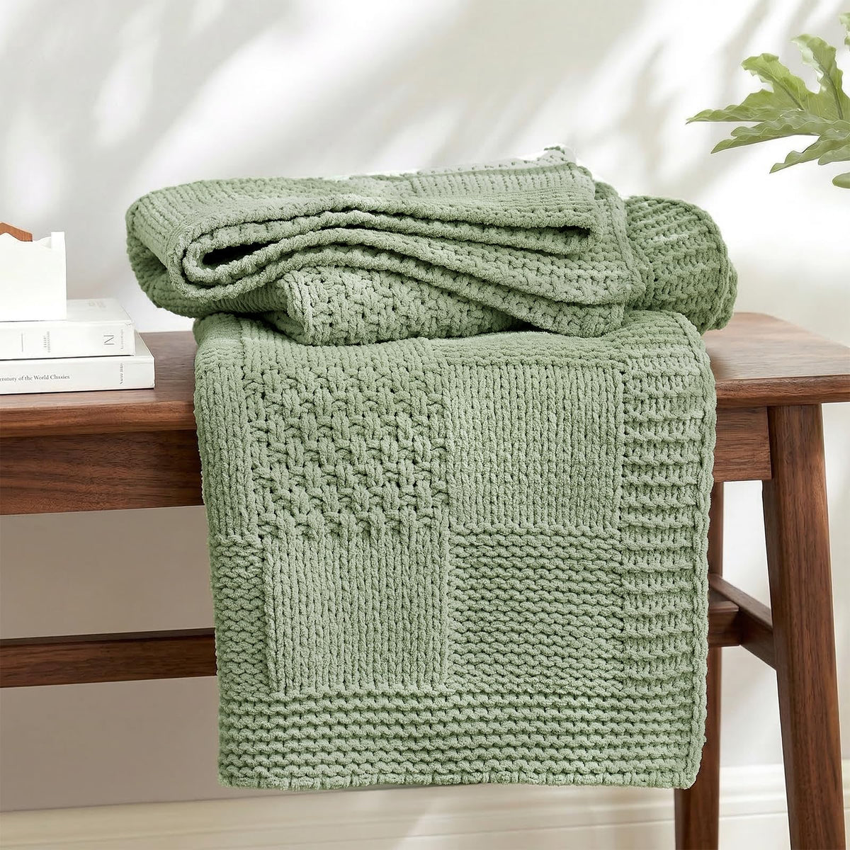 Amélie Home front view of sage green checkered throw showing cozy aesthetic
