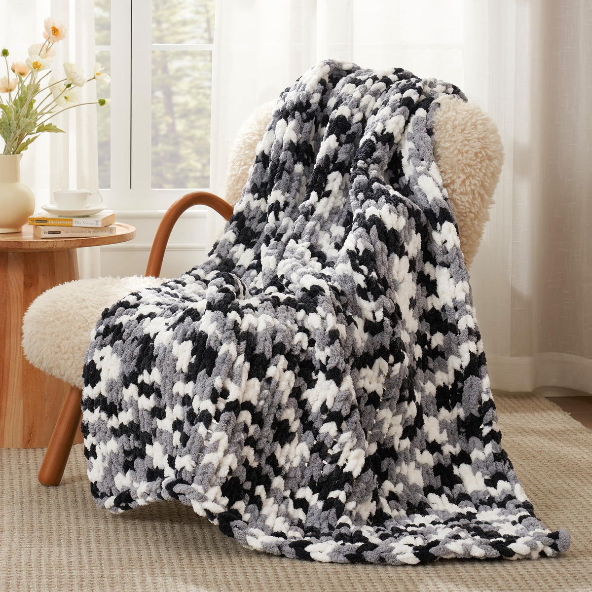 Amélie Home front view of 50x60 throw shows modern layered decor benefit
