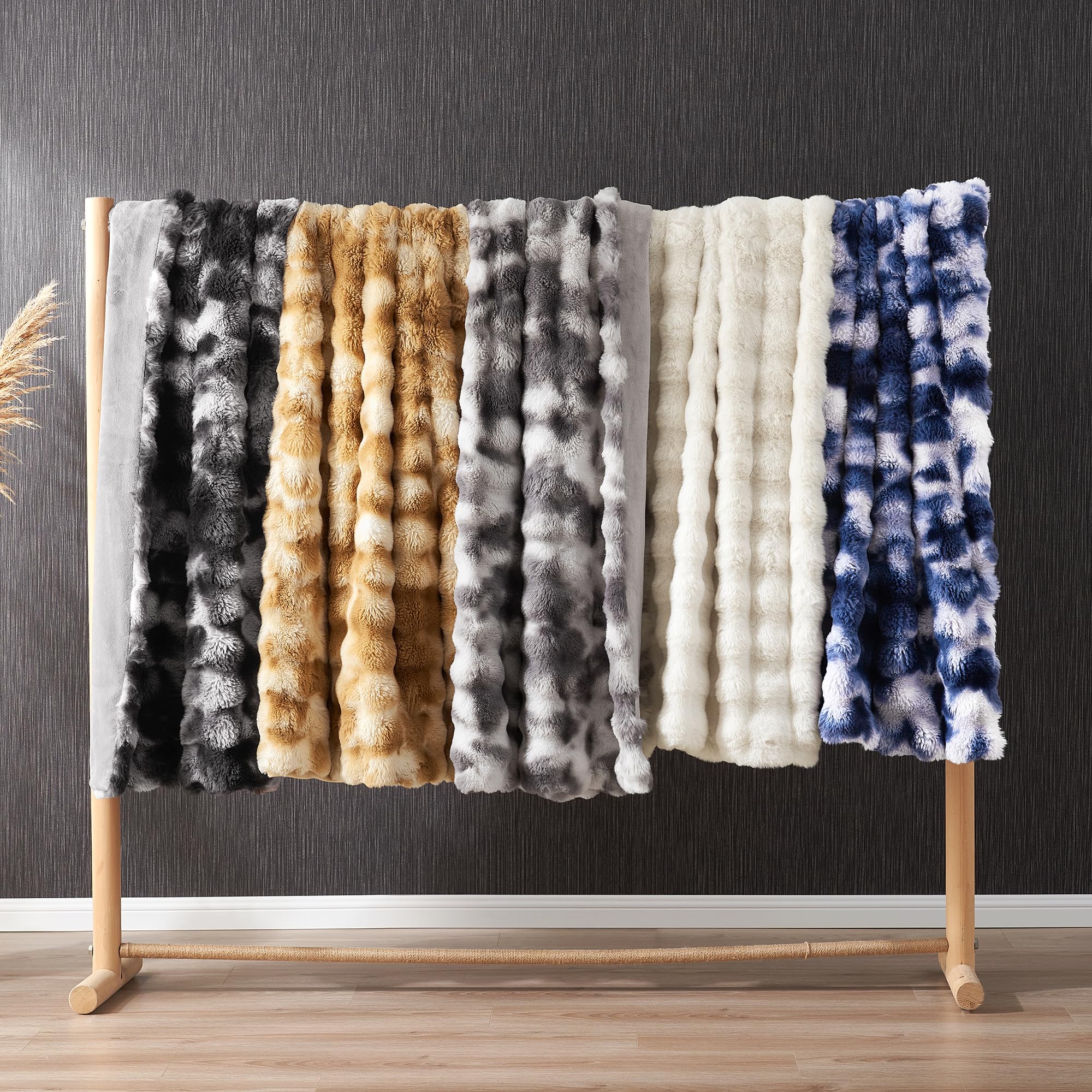 Amélie Home lifestyle living room scene showing blanket elevating decor