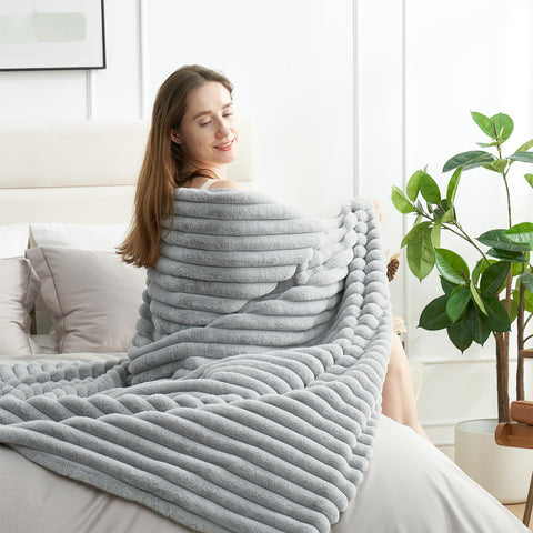 Amélie Home lifestyle with person reading on couch for relaxed comfort