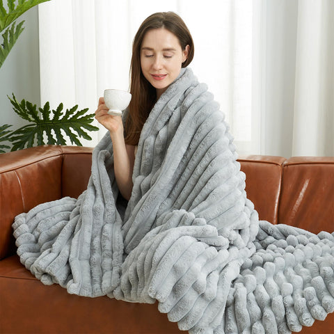 Amélie Home pet snuggling on blanket showing durability and warmth