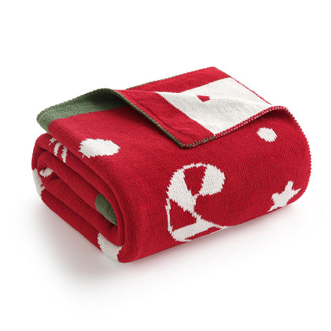 Amélie Home throw beside pillow shows scale and practical size