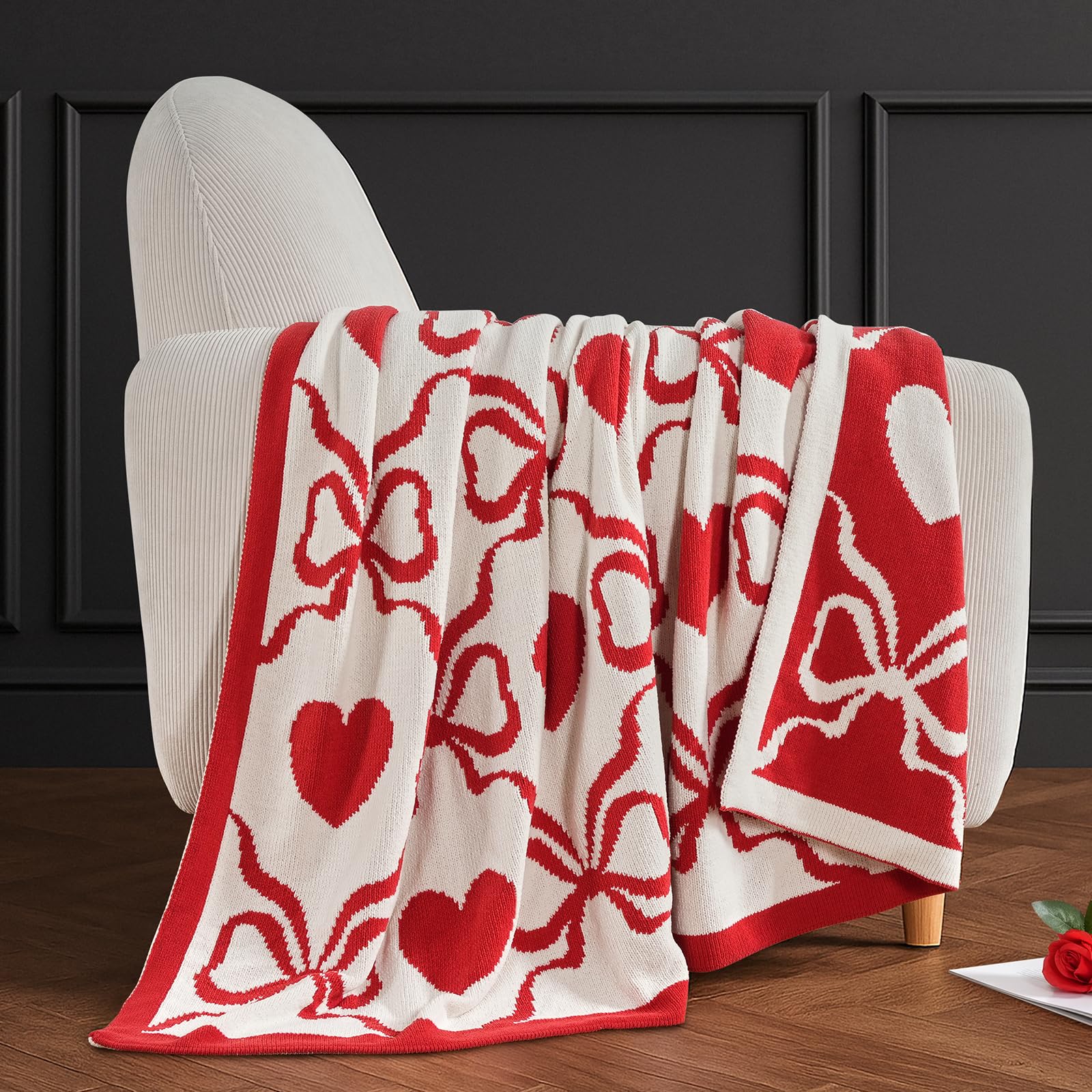 Amélie Home blanket on sofa for scale showing 50x60 size benefit