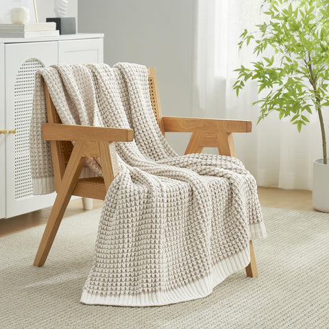 Amélie Home throw layered on bed to show decorative versatility and comfort