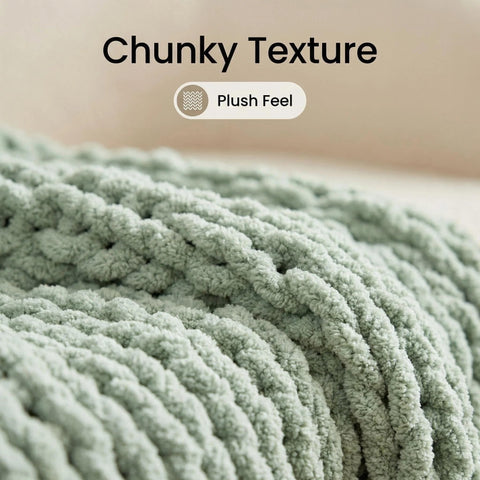 Amélie Home throw layered on bed showing decorative layering and visual warmth
