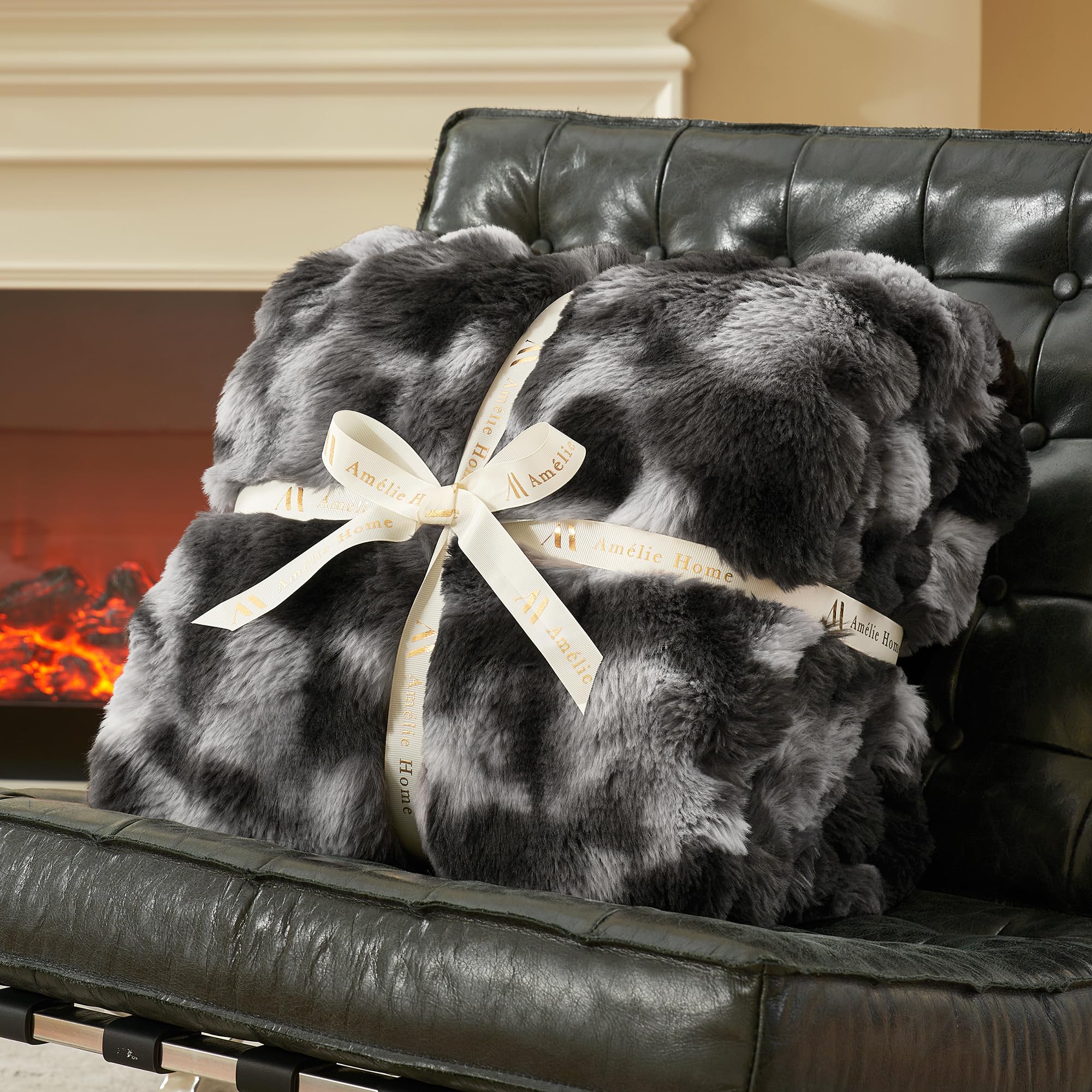 Amélie Home folded throw illustrating compact storage and gift-ready presentation