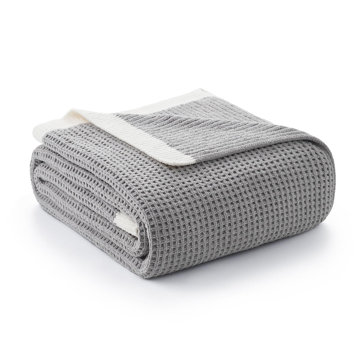 Amélie Home folded throw front view shows cozy grey warmth