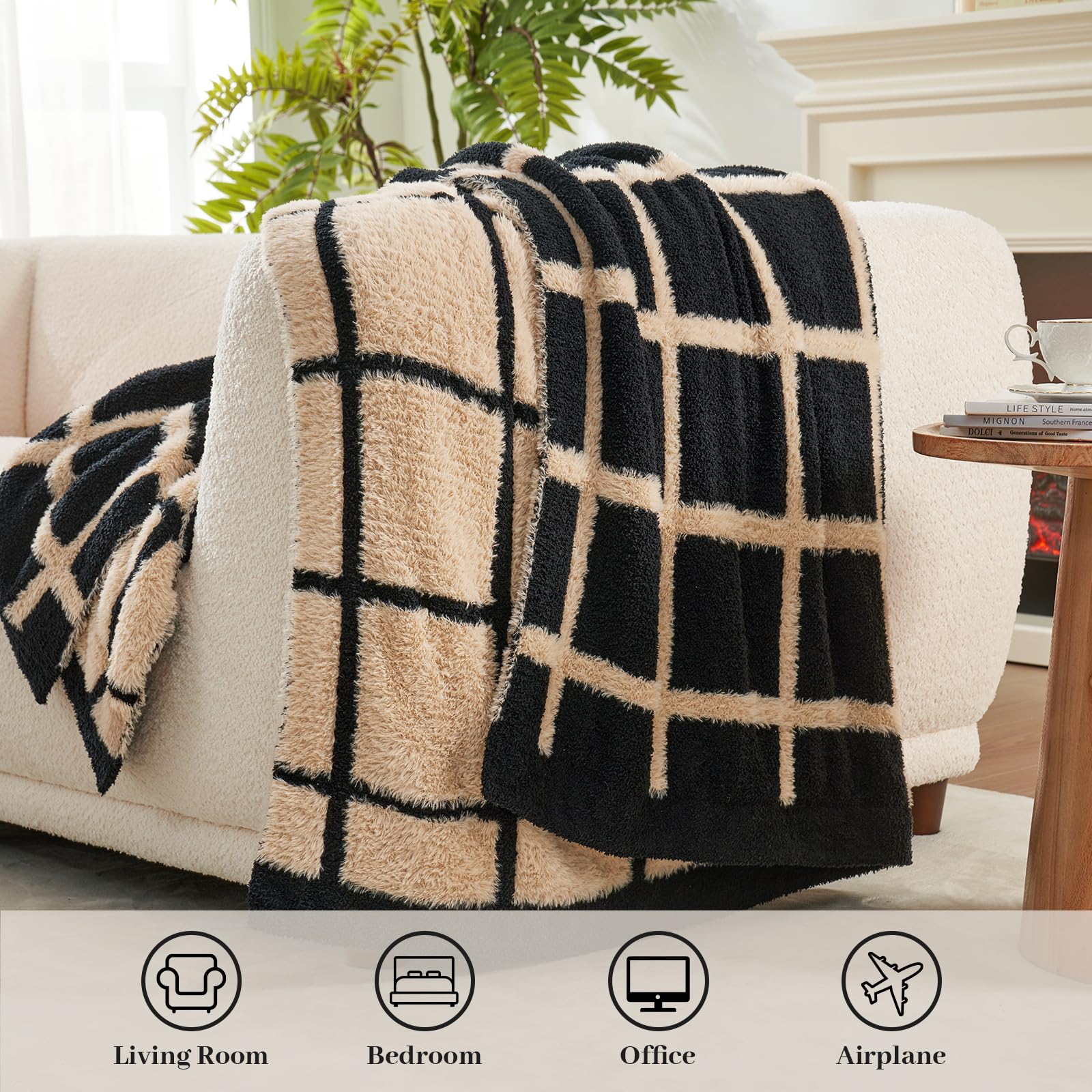 Amélie Home throw styled on couch offers immediate warmth and polished sofa decor