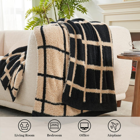 Amélie Home throw styled on couch offers immediate warmth and polished sofa decor
