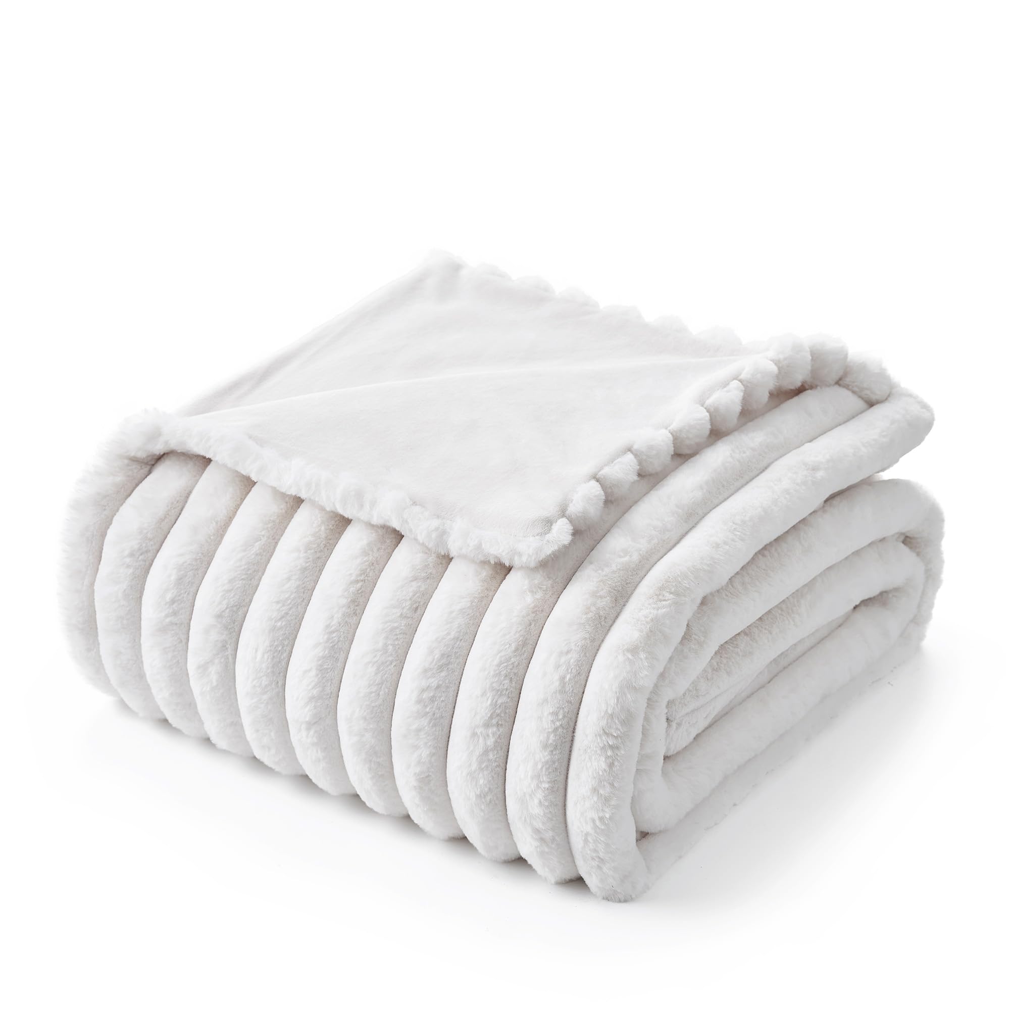 Amélie Home blanket folded in gift packaging ready for giving