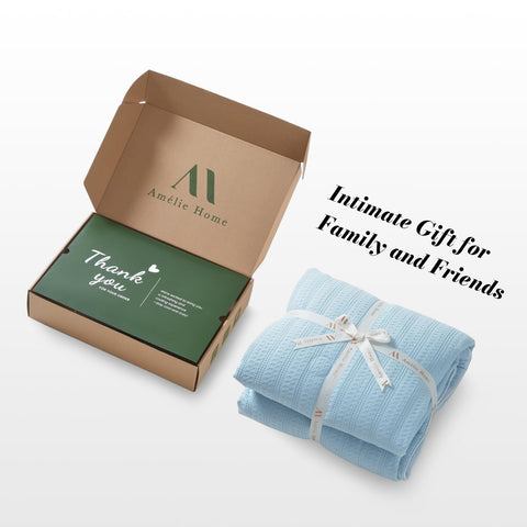 Amélie Home comforter next to ruler showing queen size and scale
