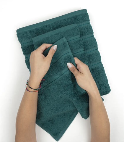 American Soft Linen towel beside water bottle showing full 27 x 54-inch scale